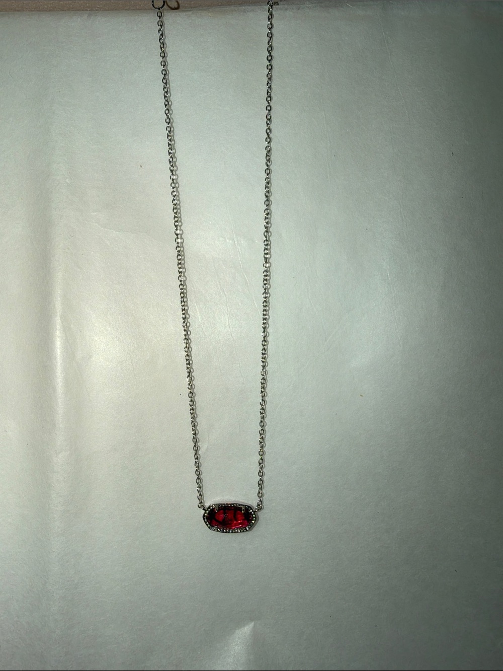 Kendra Scott Silver Necklace with Translucent Red Oval Pendant
